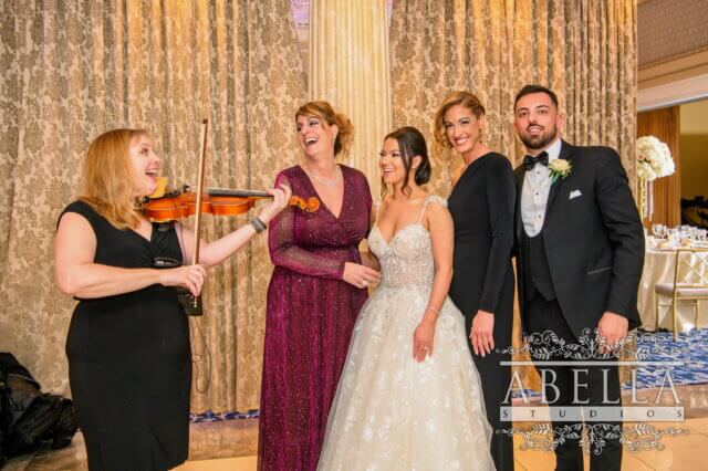 Violinist with the bride and groom