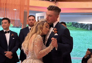 A bride and groom dancing