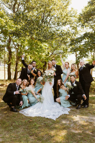 A bride and groom with their bridal party