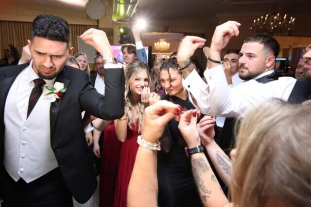 Guests on a wedding dance floor