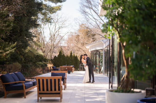 Bride and groom on a patio