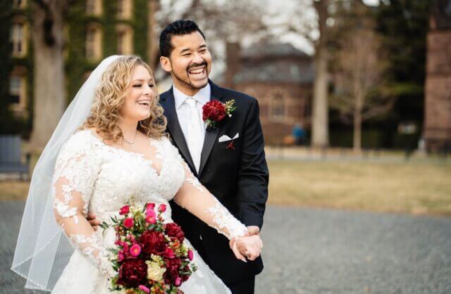 A bride and groom posing